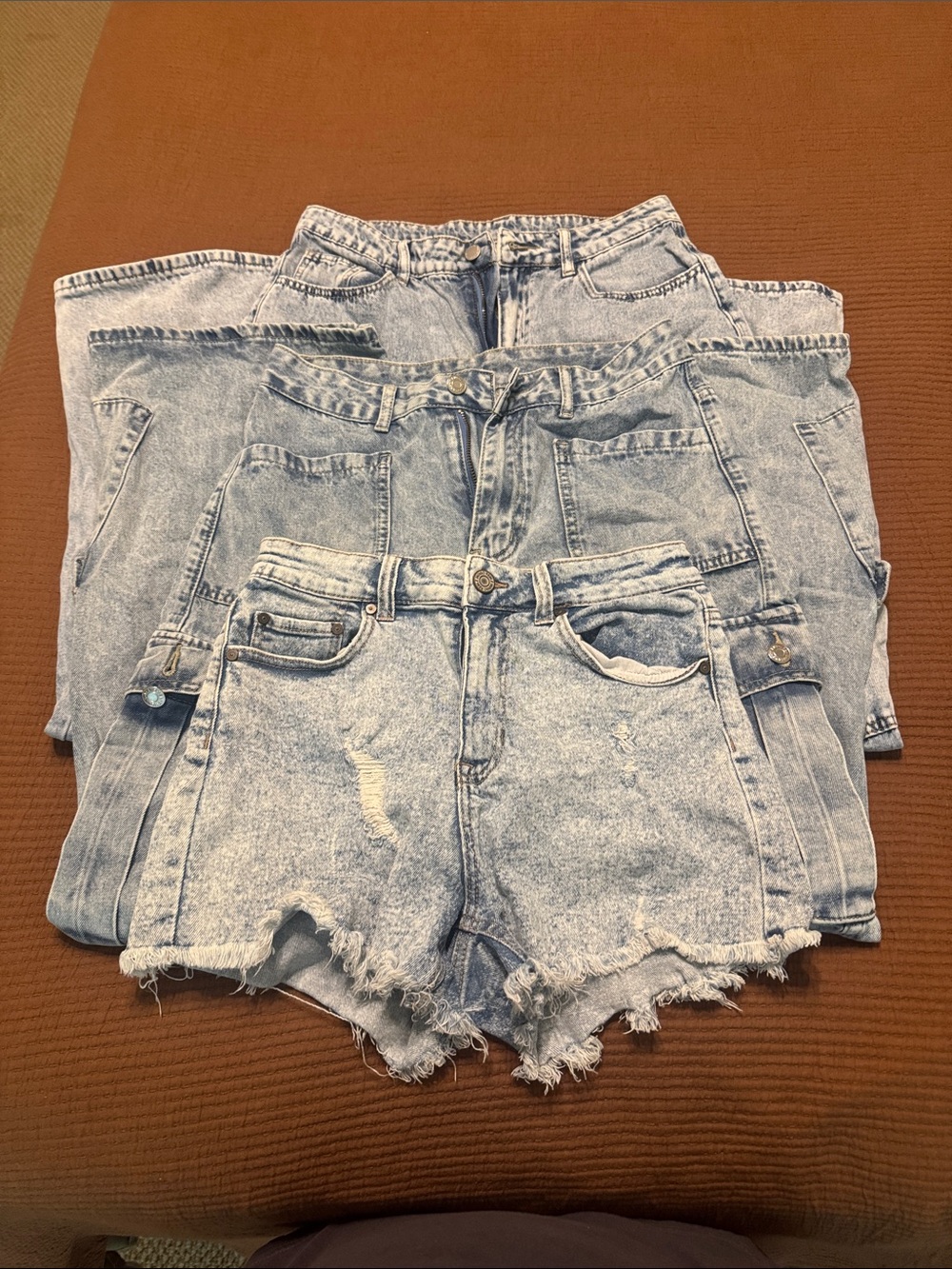 Lot of 3 size 28 clothes. 1 pair shorts, 2 pair of flare, wide leg jeans